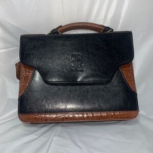 BELLEROSE clutch Black and brown with magnetic snap closure and zippers